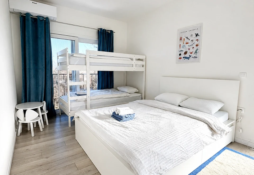 Family bedroom with bunk bed at Villa Julija