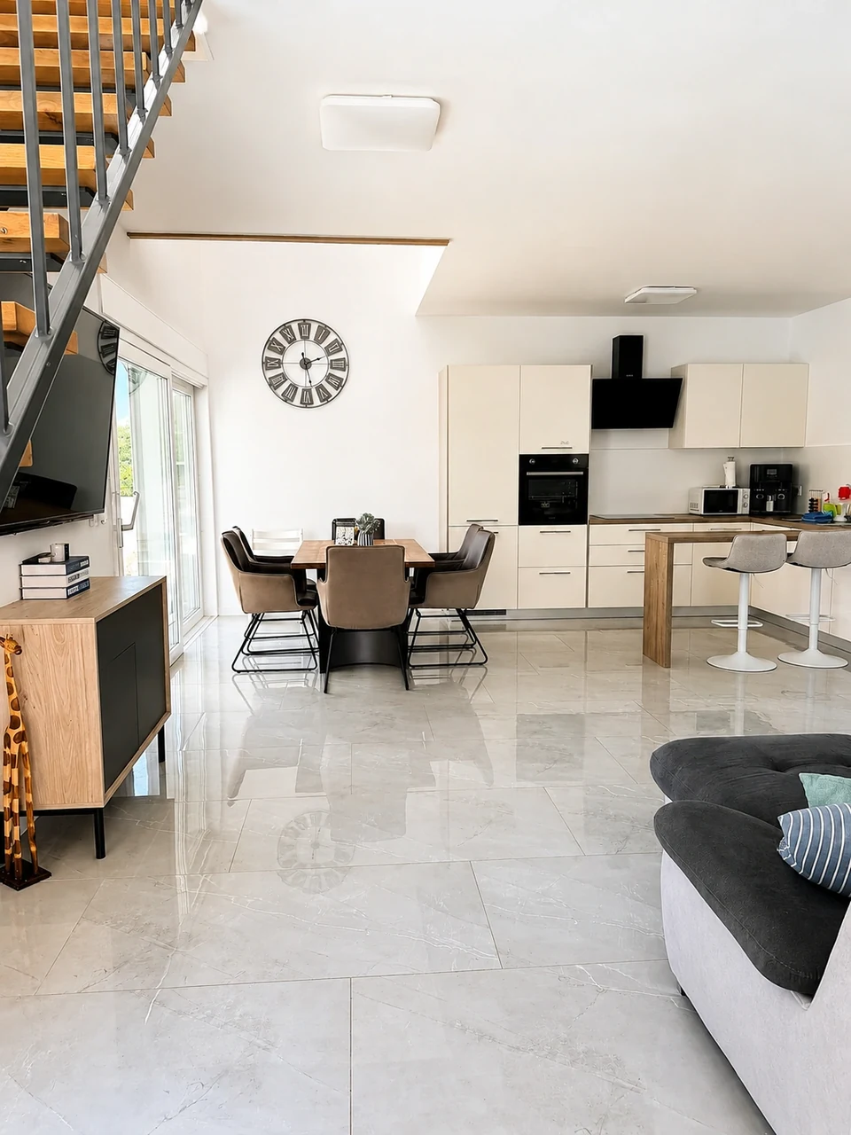 Open-plan living room and kitchen at Villa Julija